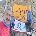 اهتزاز بیرق عزای حسینی بر فراز قله۳۱۸۴متری سید سعید خوانسار